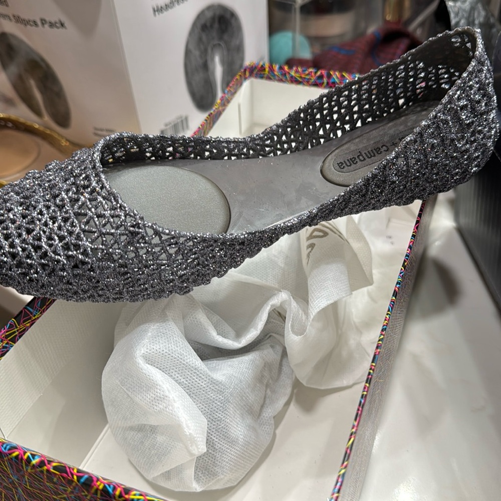 Sparkling silver comfy flat shoes runs a little big I think
